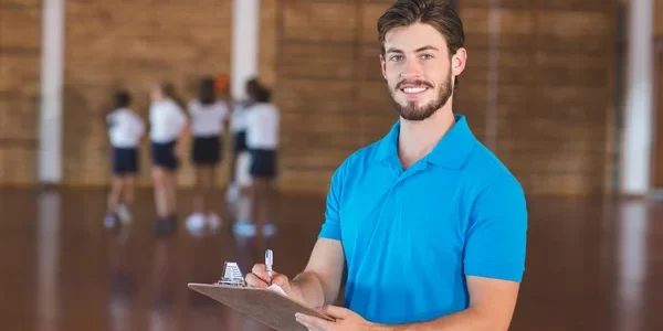 depositphotos_117214902-stock-photo-portrait-of-sports-teacher-writing